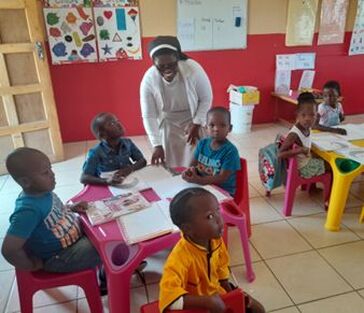 School classrom with Sister and children