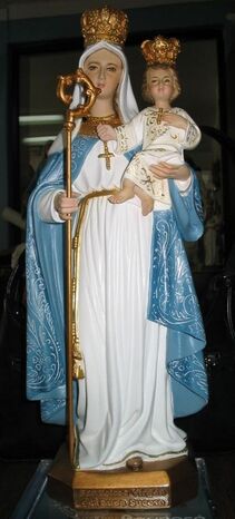 Statue of Our Blessed Lady wearing the Franciscan Cord of Saint Francis. 