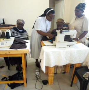 Sister teaches sewing with sewing machine